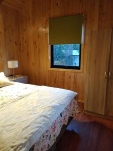 Cabañas del Lago Lican客房内的一张或多张床位