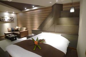 Hotel GOLF Nirasaki (Adult Only)客房内的一张或多张床位