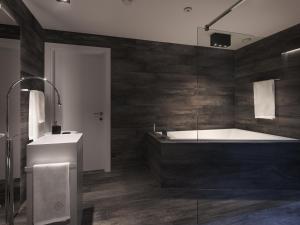 苏黎世Le Bijou Lintheschergasse / Zurich HB的带浴缸和盥洗盆的浴室
