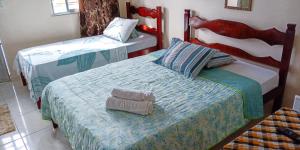 卡波布里奥Pousada Panceiro的配有2张床的客房