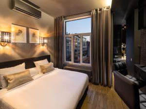 Hotel Goodnight Antwerp客房内的一张或多张床位