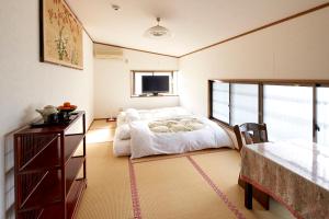 Hotobil B&B 潤 An inn that enjoys breakfast客房内的一张或多张床位