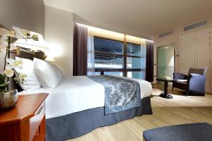 埃克赛卡尔图哈岛酒店客房内的一张或多张床位