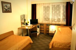 保加利亚科学院酒店客房内的一张或多张床位