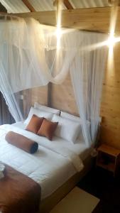 Saffron Eco Cottage客房内的一张或多张床位