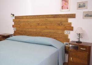 PODERE OSLAVIA AZ.AGR.BIO GIANNINI客房内的一张或多张床位