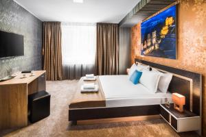 Central Point Boutique Hotel客房内的一张或多张床位