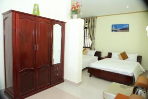 Khách sạn TNK客房内的一张或多张床位