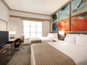 Buena Vista Suites Orlando客房内的一张或多张床位