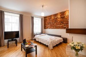 Old Riga Aldaru street Apartment 2客房内的一张或多张床位