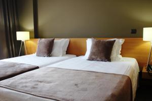 霍奥多姆酒店客房内的一张或多张床位