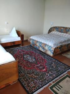 Hotel Sartepo客房内的一张或多张床位