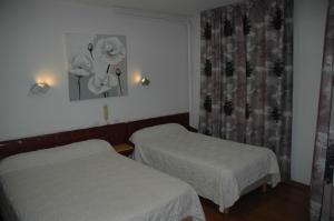 卢森堡酒店客房内的一张或多张床位