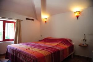 Molino de Las Tablas客房内的一张或多张床位