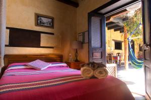 Posada del Abuelito (Hostel)客房内的一张或多张床位