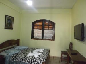 卡拉瓜塔图巴Francis Hotel Pousada的相册照片