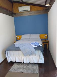 Pousada Container Eco Manguinhos客房内的一张或多张床位
