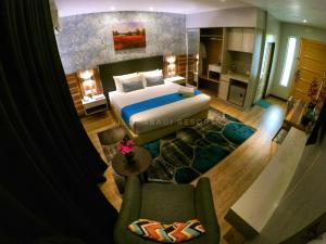 阿巴迪别墅度假酒店客房内的一张或多张床位