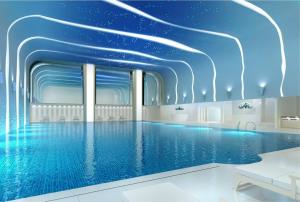 北京北京日坛宾馆的蓝色天花板游泳池的 ⁇ 染