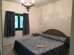 Villa de Cactualdea客房内的一张或多张床位