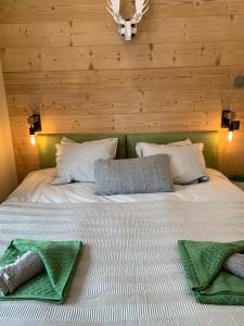 Apartment Maya, La Praz, Chamonix Mont Blanc客房内的一张或多张床位