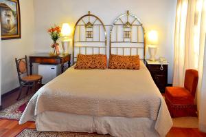 圣玛丽亚皇家酒店客房内的一张或多张床位