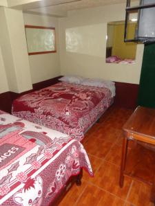 Hotel Landivar Zona 7客房内的一张或多张床位