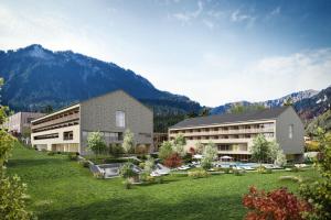 梅劳Hotel die Wälderin-Wellness, Sport & Natur的山地酒店 ⁇ 染的背景