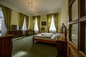 Hotel Na Zámečku客房内的一张或多张床位