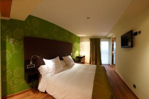 埃古伦乌加特酒店客房内的一张或多张床位