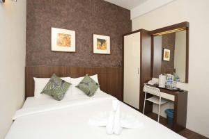 Hotel Westree KL Sentral客房内的一张或多张床位