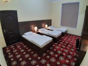 City Hostel Dushanbe客房内的一张或多张床位