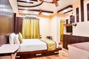 Hotel Bangabhumi客房内的一张或多张床位