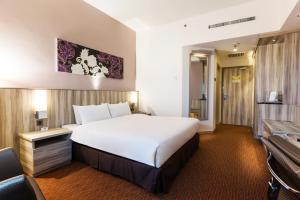 佩奈阳威酒店客房内的一张或多张床位