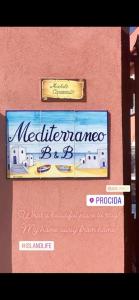 普罗奇达B&B Mediterraneo的大楼一侧餐厅标志