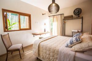 Vilarejo Guesthouse - Silêncio e Aconchego客房内的一张或多张床位