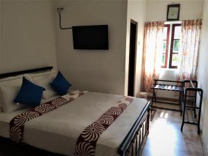 Barcode Residencies - Nuwara Eliya客房内的一张或多张床位