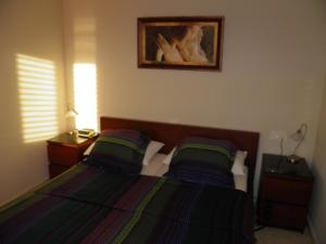 Alojamiento Los Corrales客房内的一张或多张床位