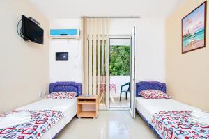 Apartments Porto Bjelila客房内的一张或多张床位