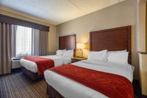 绿湾康福特套房酒店客房内的一张或多张床位