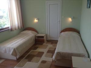 Villa Omiros客房内的一张或多张床位