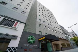 大阪Hotel Binario Umeda的一座建筑,设有elvadoaquinaquin酒店