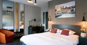 布鲁塞尔阿特拉斯酒店客房内的一张或多张床位