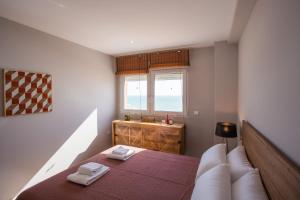ALTAMAR Sunny Home by Cadiz4Rentals客房内的一张或多张床位