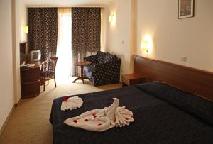 Hotel Yunona - All Inclusive客房内的一张或多张床位