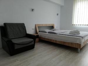 Complex Central Orsova客房内的一张或多张床位