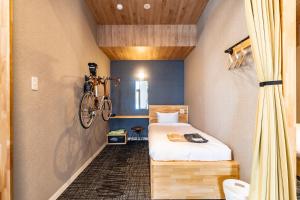 I-Link Hostel & Cafe Shimanami客房内的一张或多张床位