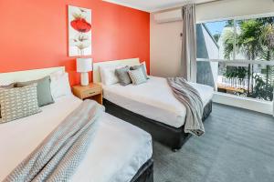 珊瑚树酒店客房内的一张或多张床位