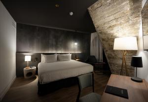 Hotel Tayko Bilbao客房内的一张或多张床位