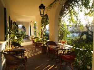 Hotel Villa Victoria de Tigre餐厅或其他用餐的地方